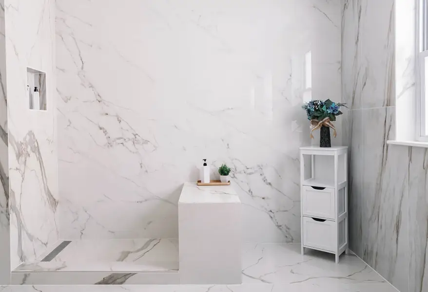 Groutless Shower Marble in Bethesda Showroom by Quick Remodels